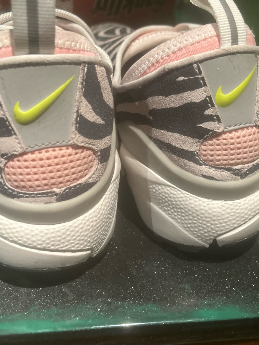 Nike Pink Zebra-Print Athletic Shoes with Neon Yellow Swoosh